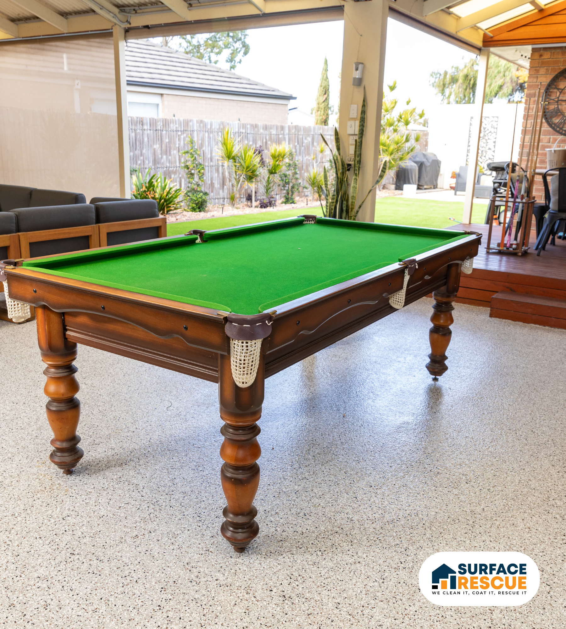 Newly resurfaced concrete driveway with decorative fleck finish at an Adelaide home by Surface Rescue.