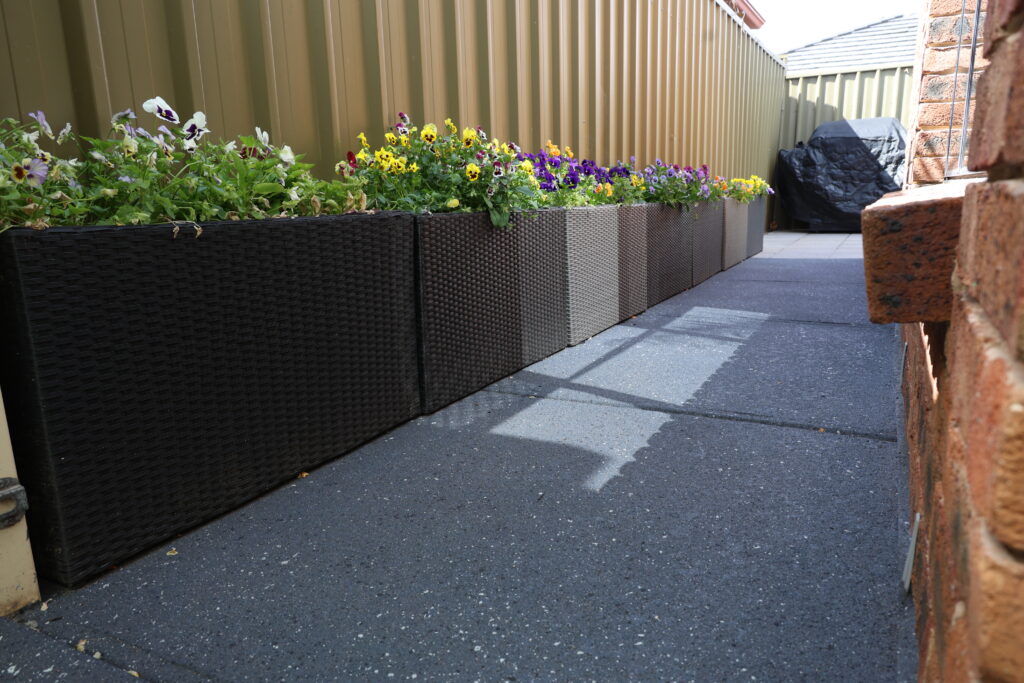 Modern epoxy flooring showcasing expert resurfacing and exterior cleaning solutions.