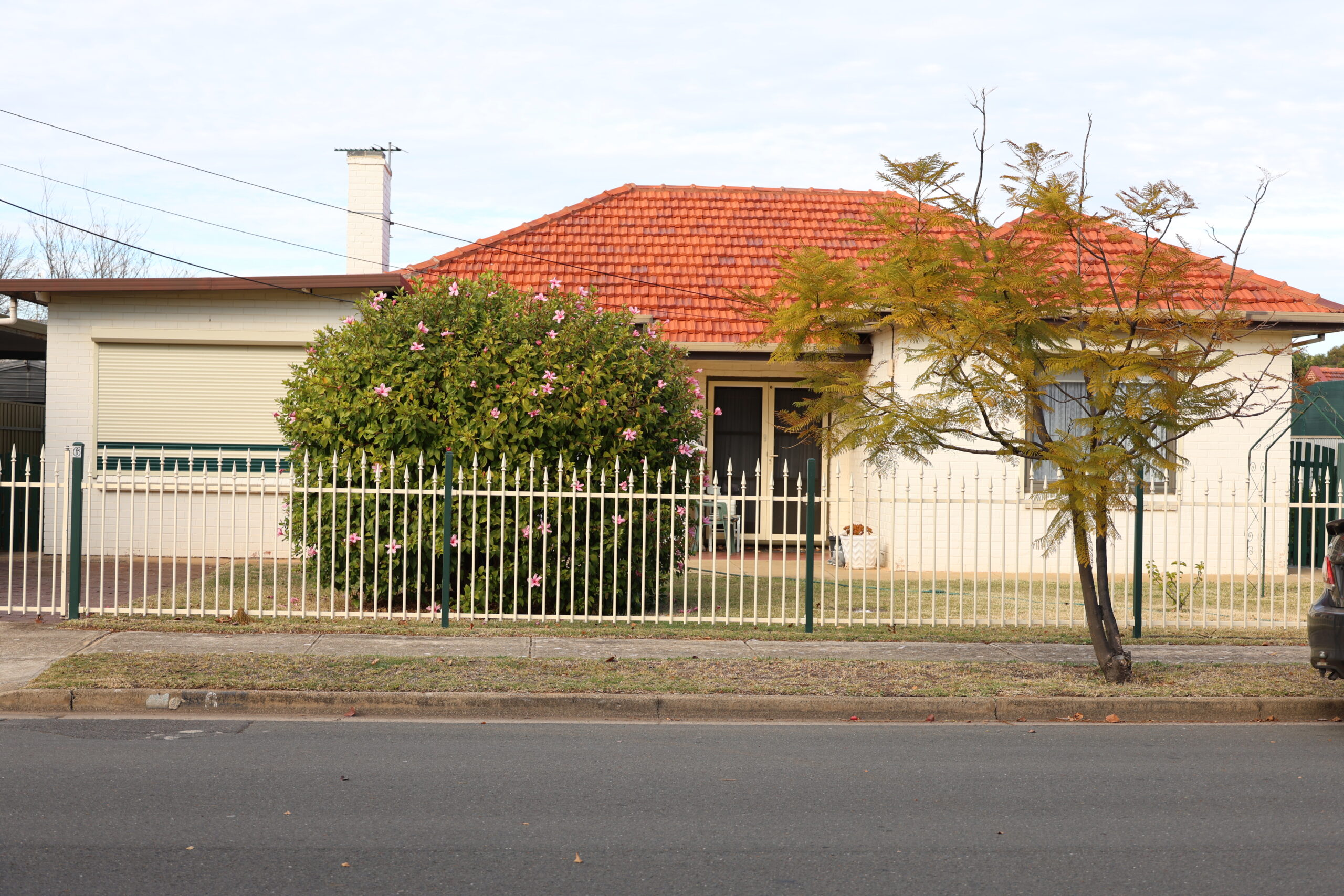 Freshly resurfaced concrete roof showcasing expert exterior cleaning results