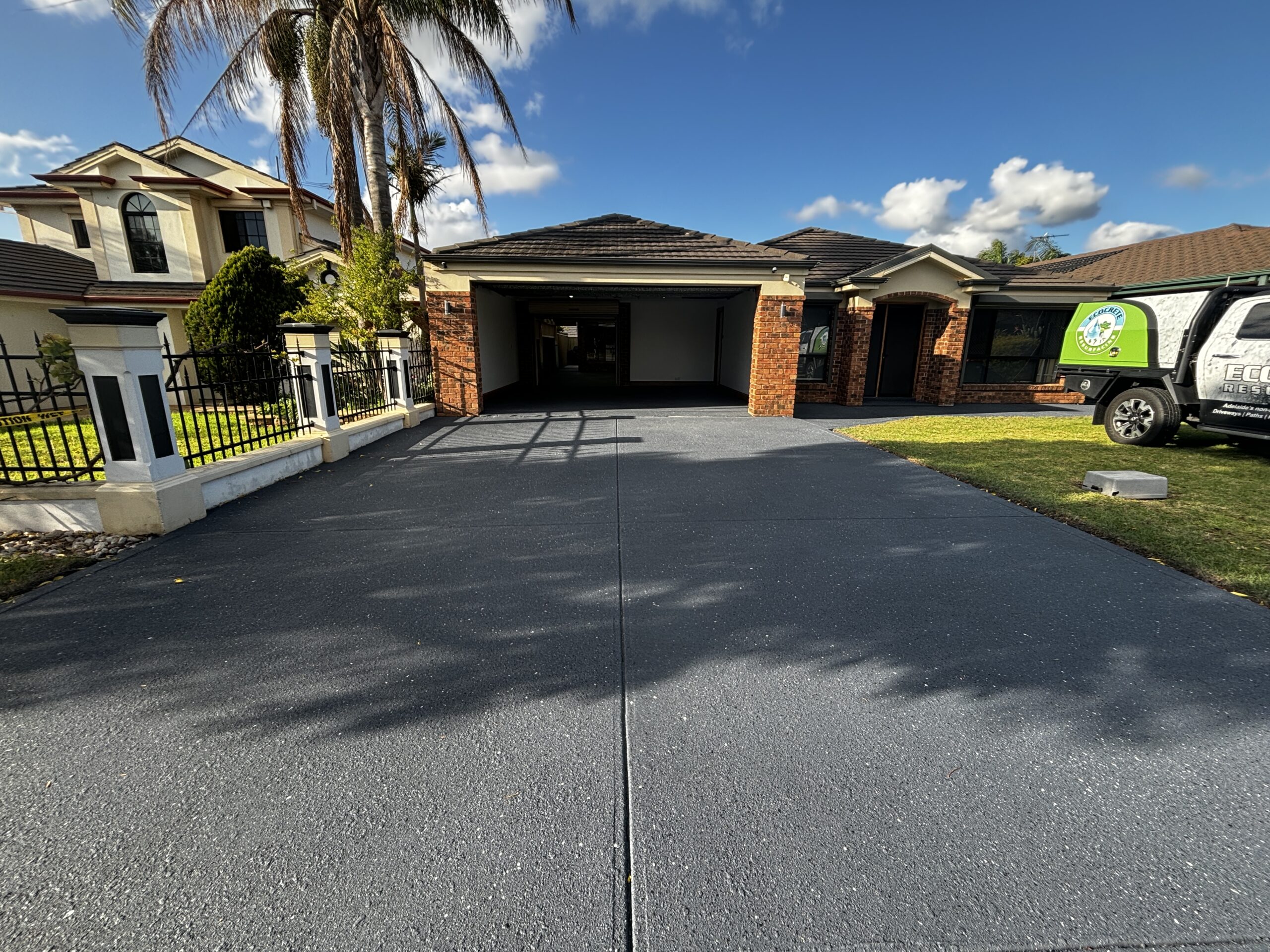 Concrete surface with fresh epoxy flooring and exterior cleaning in Adelaide.