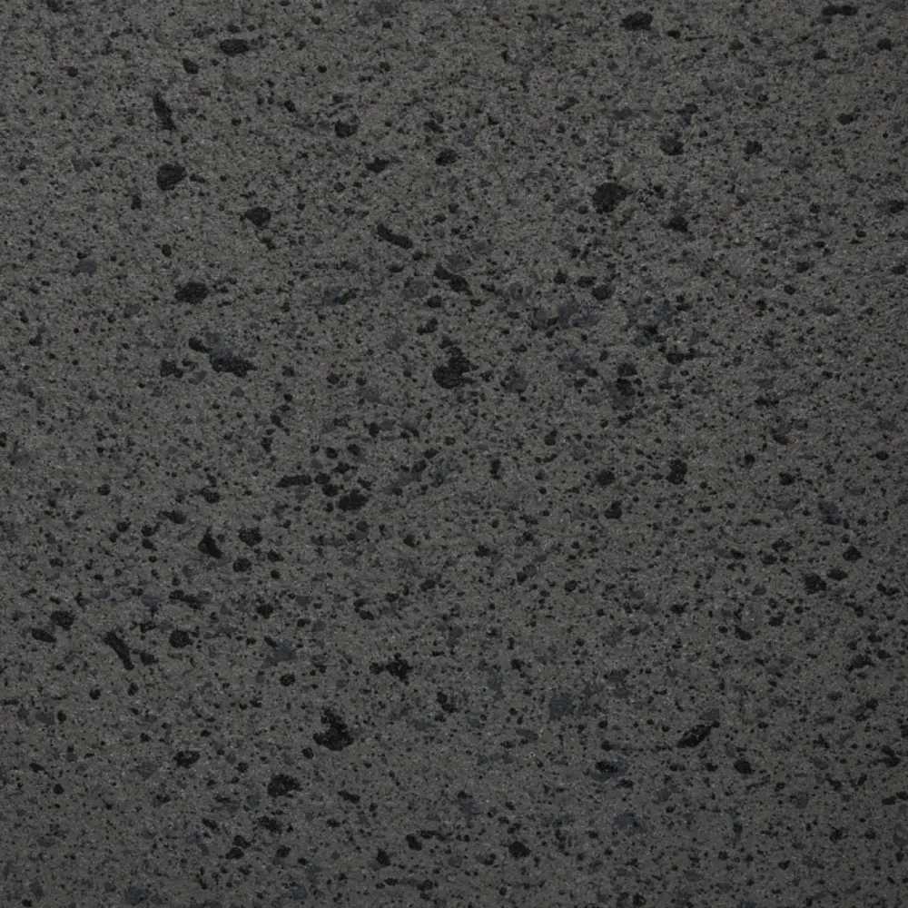 Close-up of a dark grey speckled coating colour sample