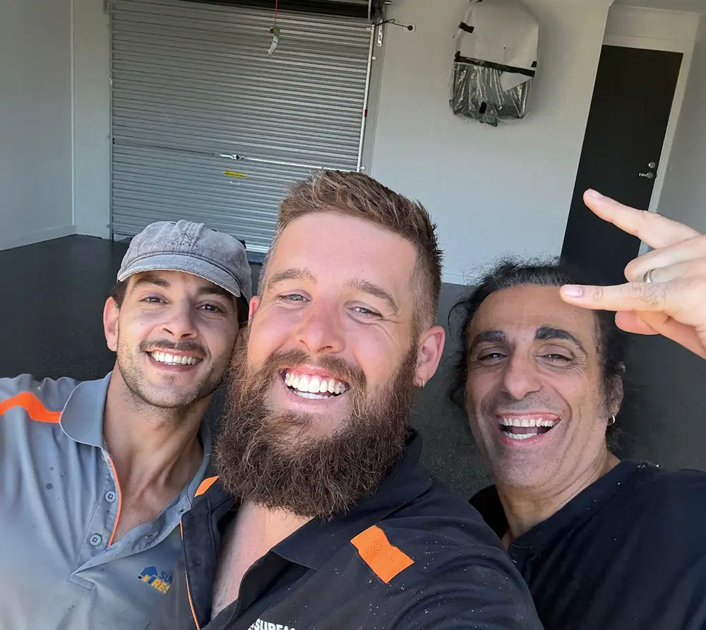 Surface rescue team members with a happy client after completing a job