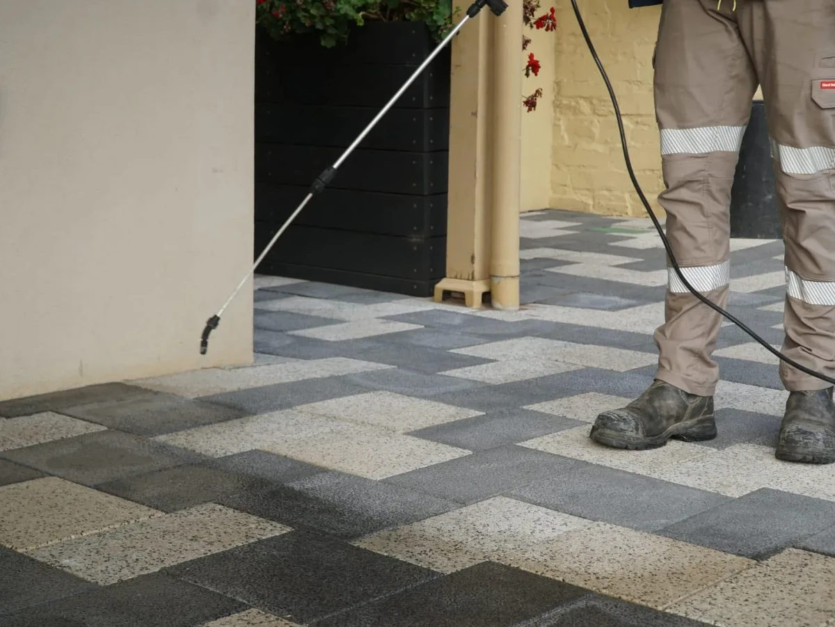 Surface Rescue technician sealing pavers