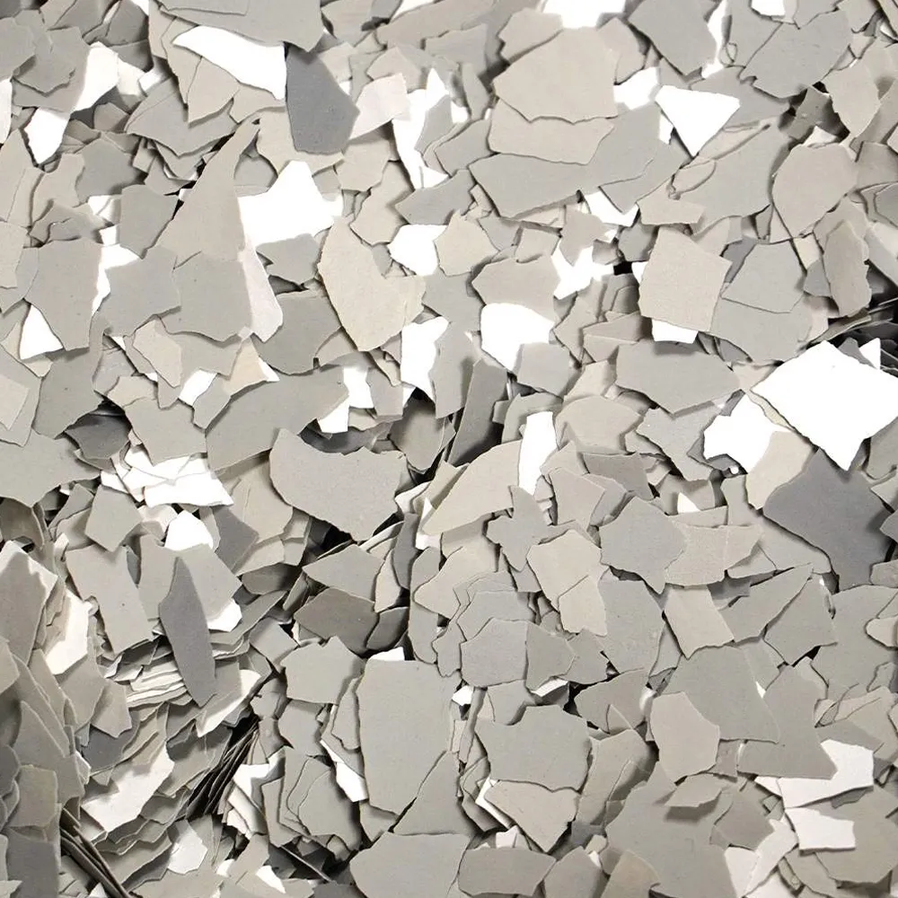 Smoke flake colour sample with grey, taupe, white and charcoal chips